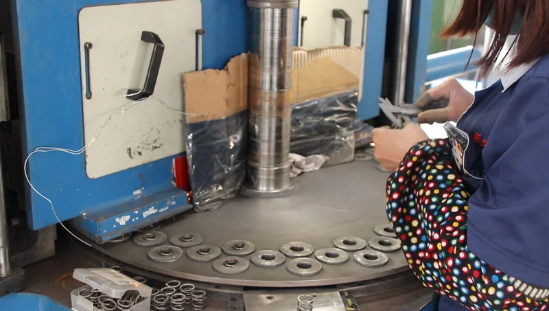 Compression spring end treatment