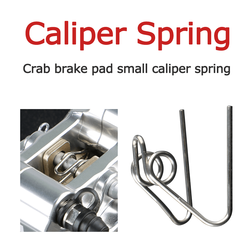 Caliper brake pad torsion spring