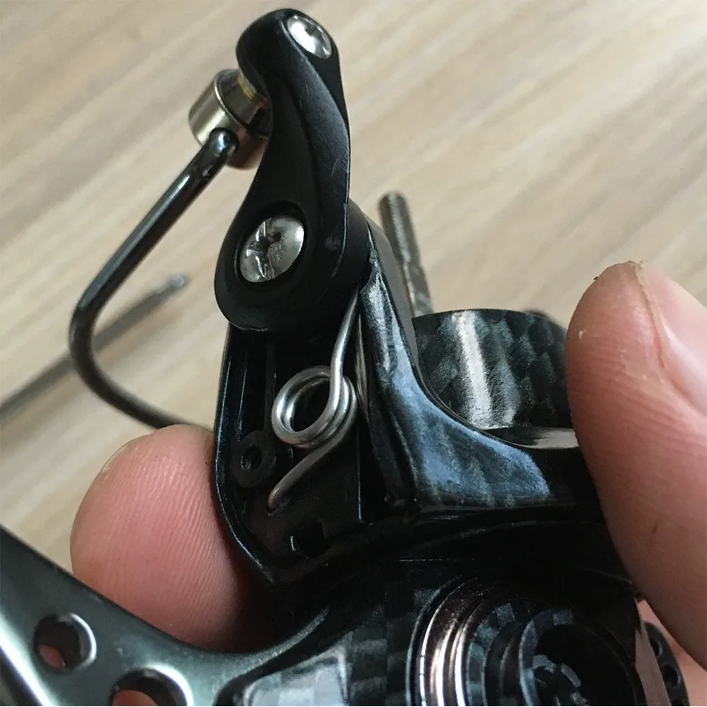 spinning wheel torsion spring