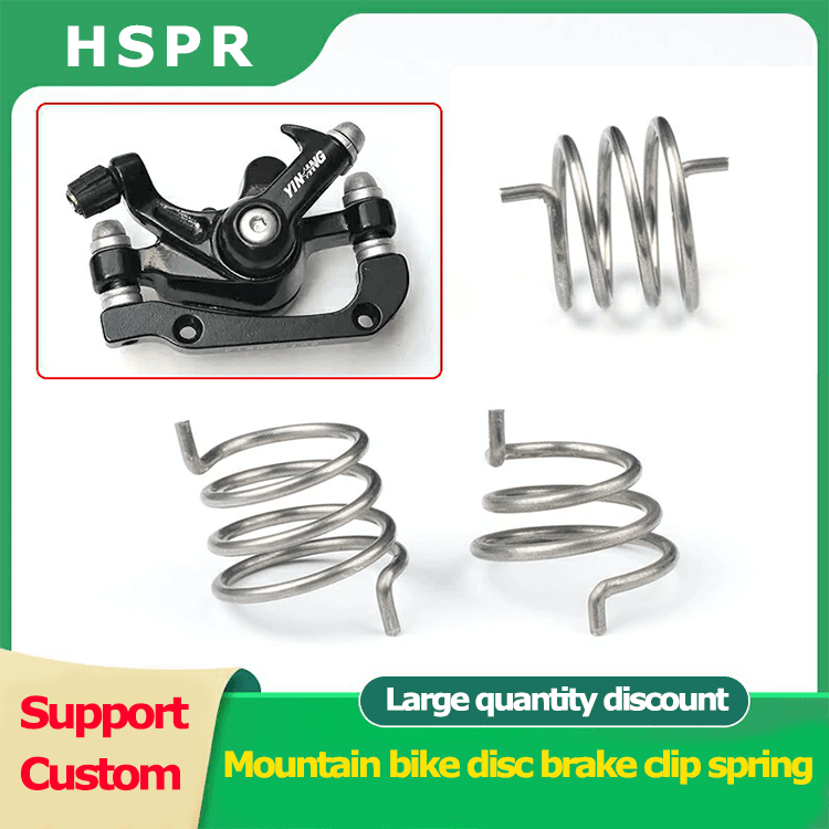 Bicycle disc brake caliper return spring